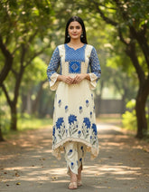 Cream And Blue Muslin Party Wear 2-Piece Suit With Mirror Work And Tulip Pants