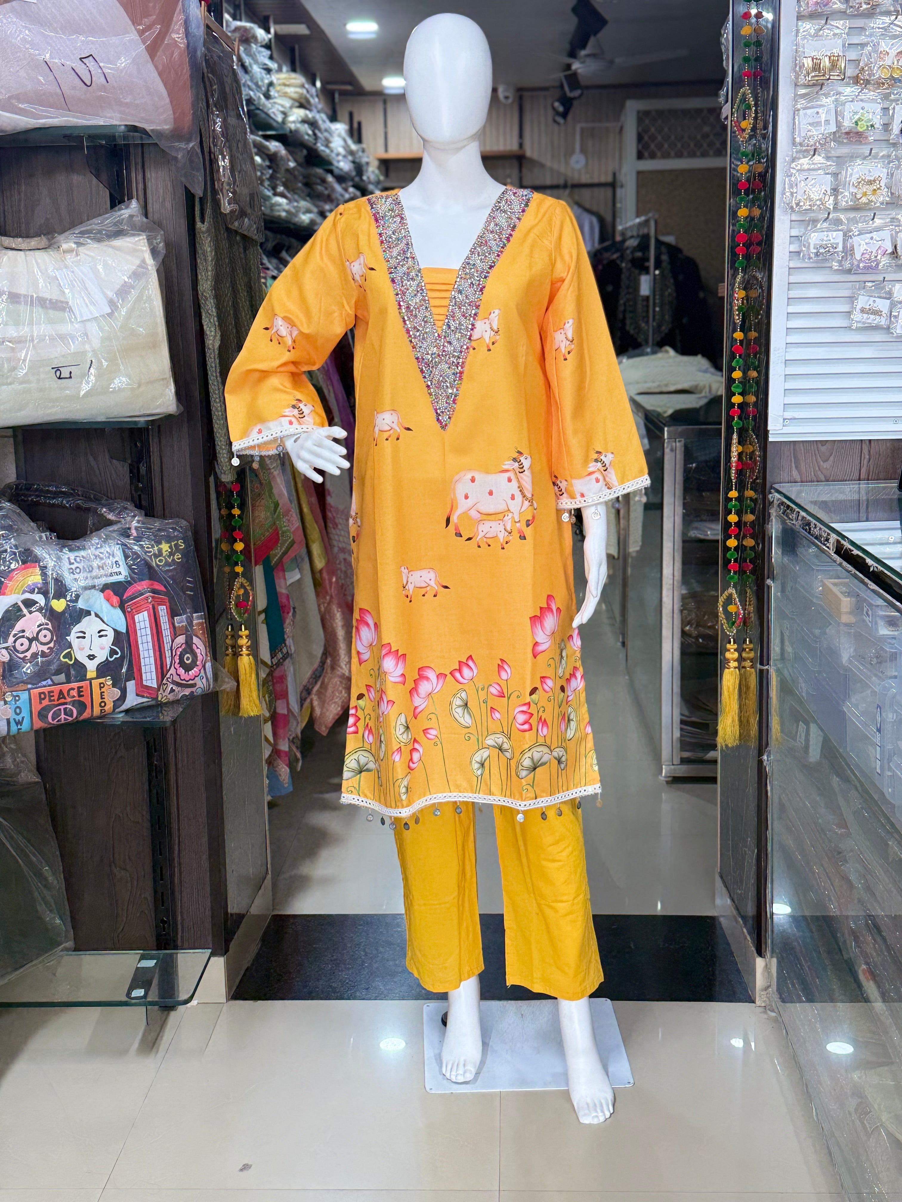Yellow Premium Cotton Designer Suit With Beautiful Lace And Ginni Work